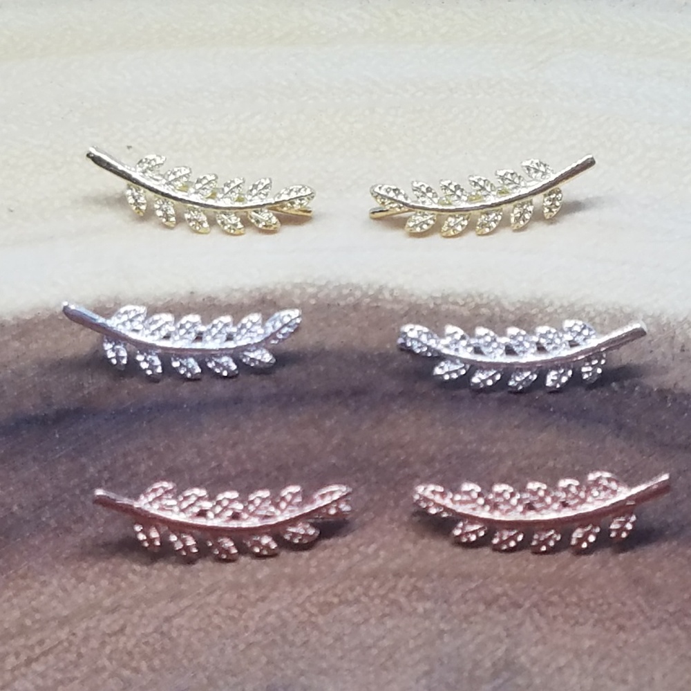 3 pairs of Leaf Earrings. ear climber